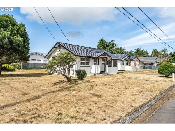 a house with trees in the background