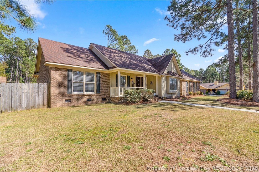 7756 Dragonhead Road Fayetteville, NC 28311 - Photo 5 of 42 a house with swimming pool in front of it