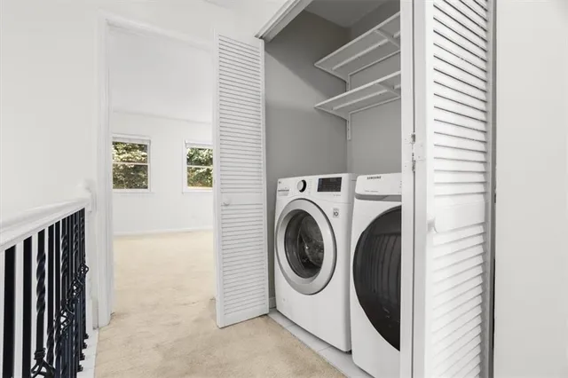 a utility room with dryer and washer