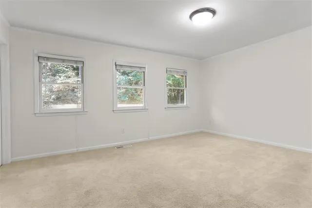 an empty room with windows