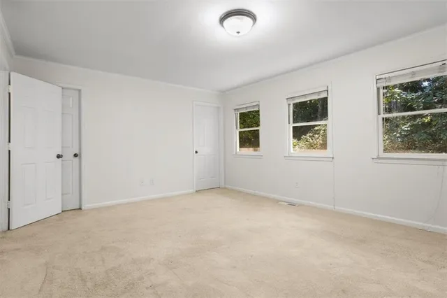 an empty room with windows