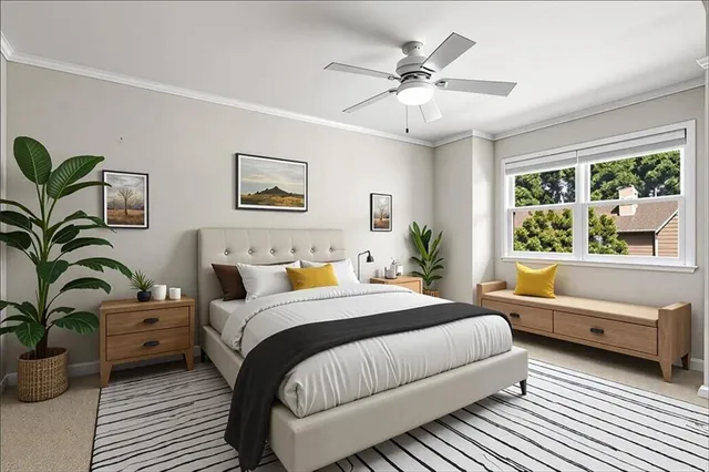 a bedroom with a large bed couch and a window