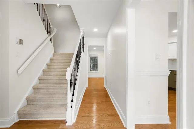 a view of entryway with wooden floor