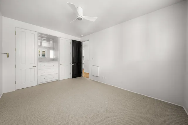 a kitchen with a sink and a stove top oven