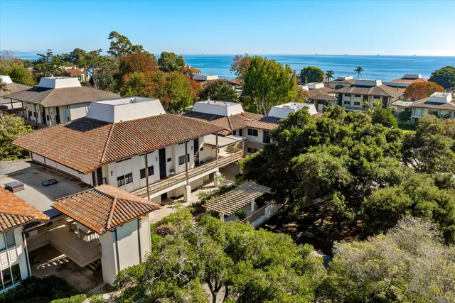 a view of a swimming pool with lounge chair