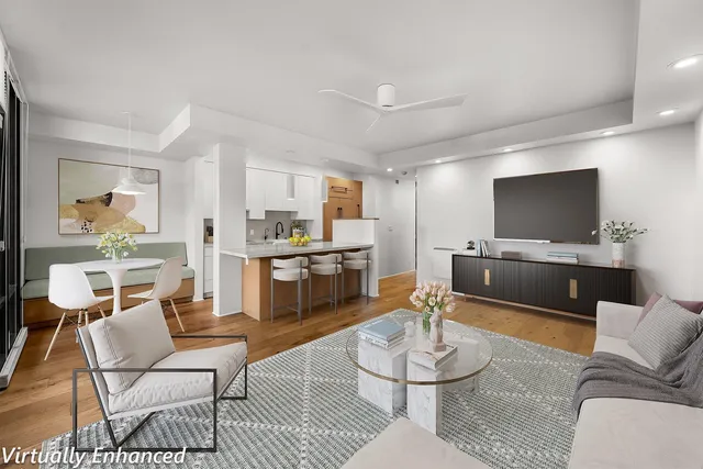 a living room with furniture and large window