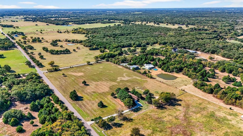 5023 West Line Road Whitesboro, TX 76273 - Photo 11 of 40 an aerial view of a house with a yard