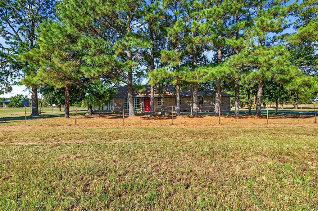 5023 West Line Road Whitesboro, TX 76273 - Photo 12 of 40 a house view with swimming pool in outdoor space