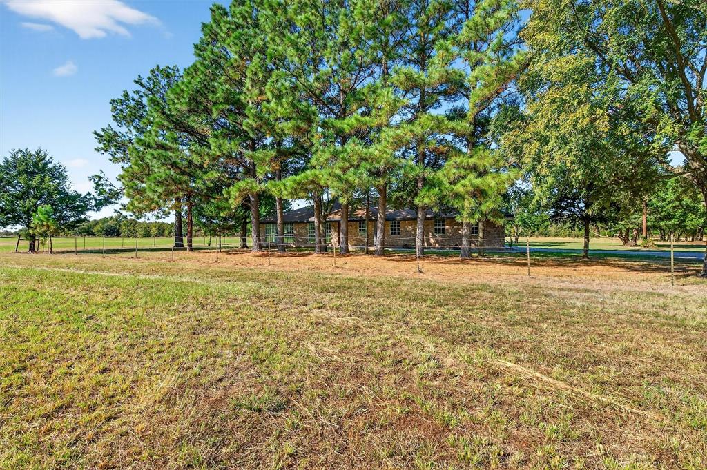 5023 West Line Road Whitesboro, TX 76273 - Photo 40 of 40 a house view with a outdoor space