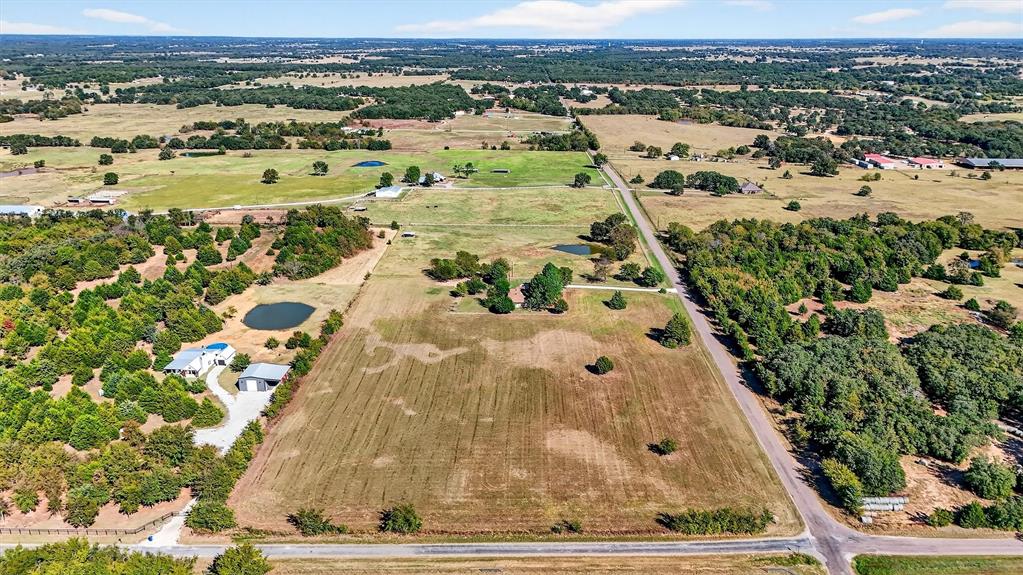5023 West Line Road Whitesboro, TX 76273 - Photo 5 of 40 an aerial view of residential houses with outdoor space