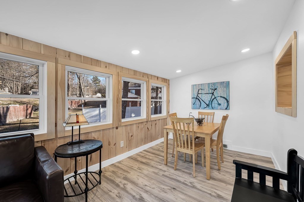 4 Brows Beach Road Wales, MA 01081 - Photo 3 of 41 a dining room with furniture a window and wooden floor