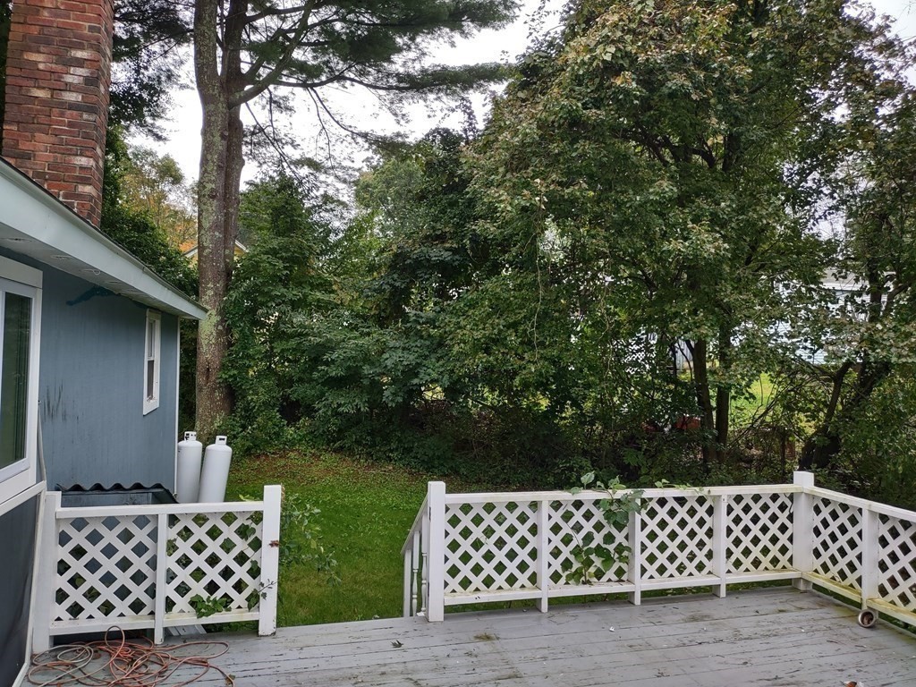 4 Brows Beach Road Wales, MA 01081 - Photo 34 of 41 a wooden fence with trees in the background