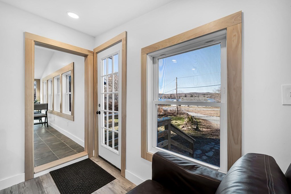 4 Brows Beach Road Wales, MA 01081 - Photo 6 of 41 a view of a hallway with a livingroom with furniture