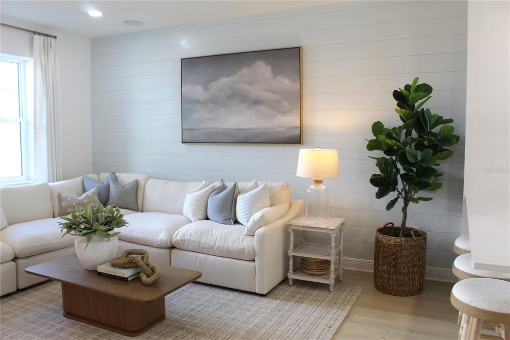 17736 Broadleaf Loop Venice, FL 34293 - Photo 5 of 16 a living room with furniture potted plant and a window