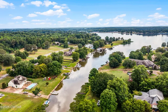 a view of a lake with a city
