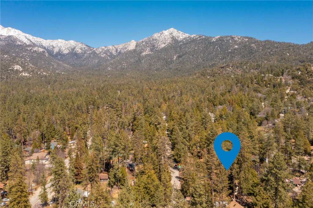 53645 Country Club Drive Idyllwild, CA 92549 - Photo 33 of 33 a view of a dry yard with mountains in the background