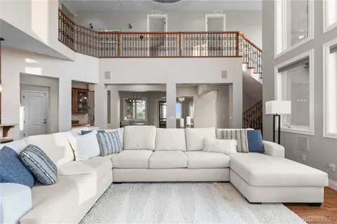 a room with furniture and a wooden floor