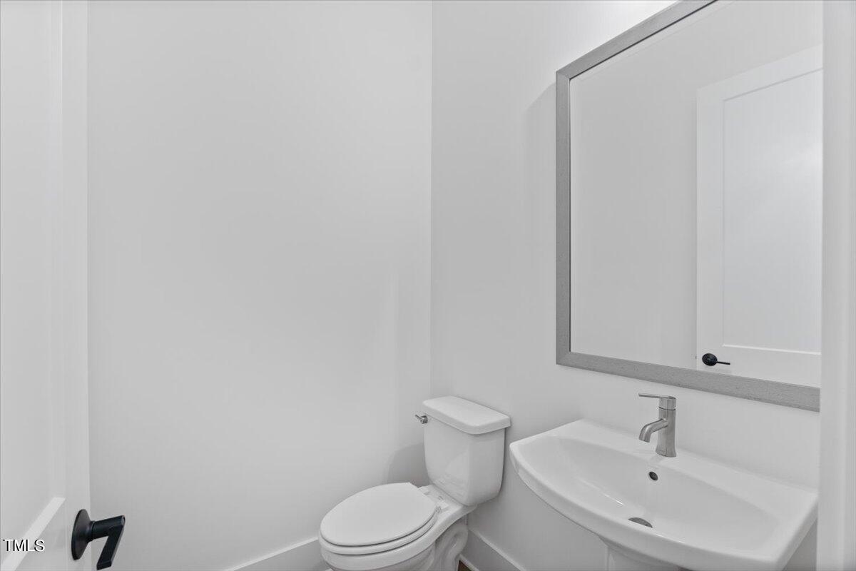 9012 Penny Road Raleigh, NC 27606 - Photo 23 of 52 Half Bath
