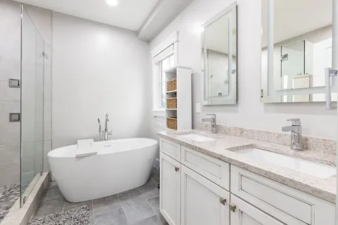 a bathroom with a shower and toilet