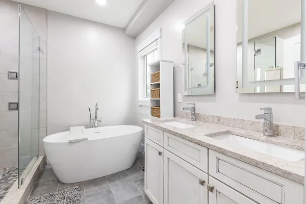 a bathroom with a shower and toilet