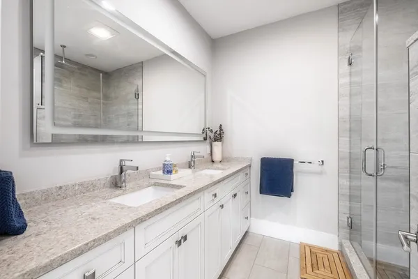 a balcony with furniture and wooden floor