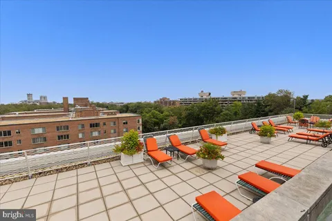 a view of roof deck with seating space