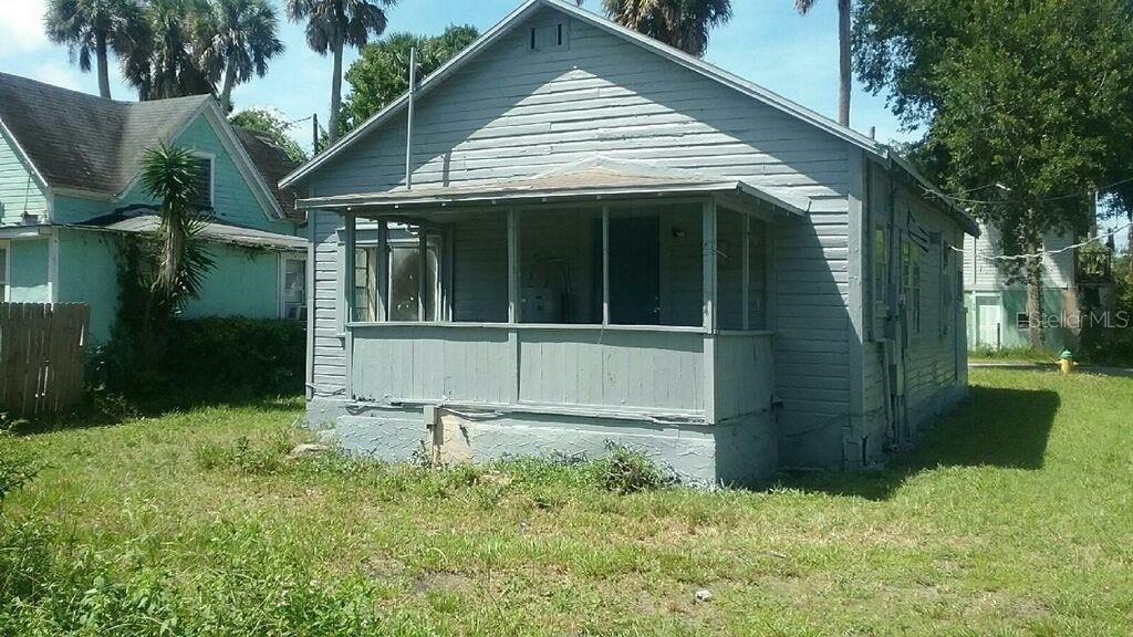 417 Maple Street Daytona Beach, FL 32114 - Photo 1 of 6 a house with trees in the background