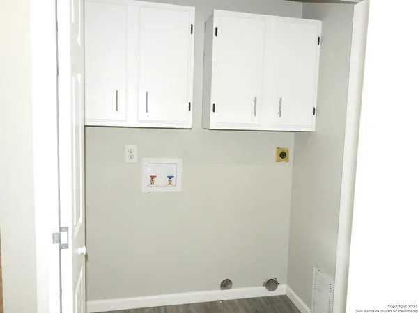 a view of walk in closet with window