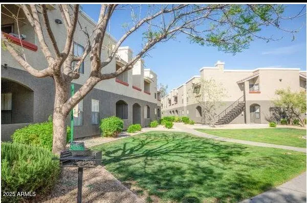 a house view with a garden space