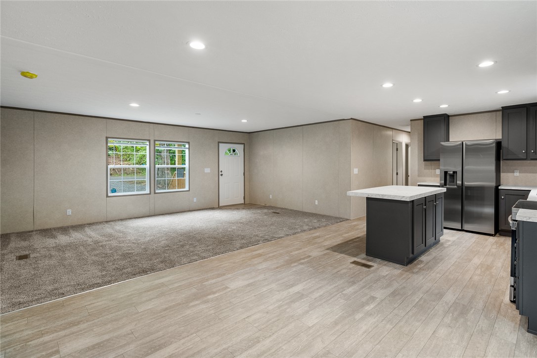 419 Austin Drive Anderson, SC 29624 - Photo 36 of 36 This bright interior features an open floor plan connecting the living space and kitchen with modern finishes.
