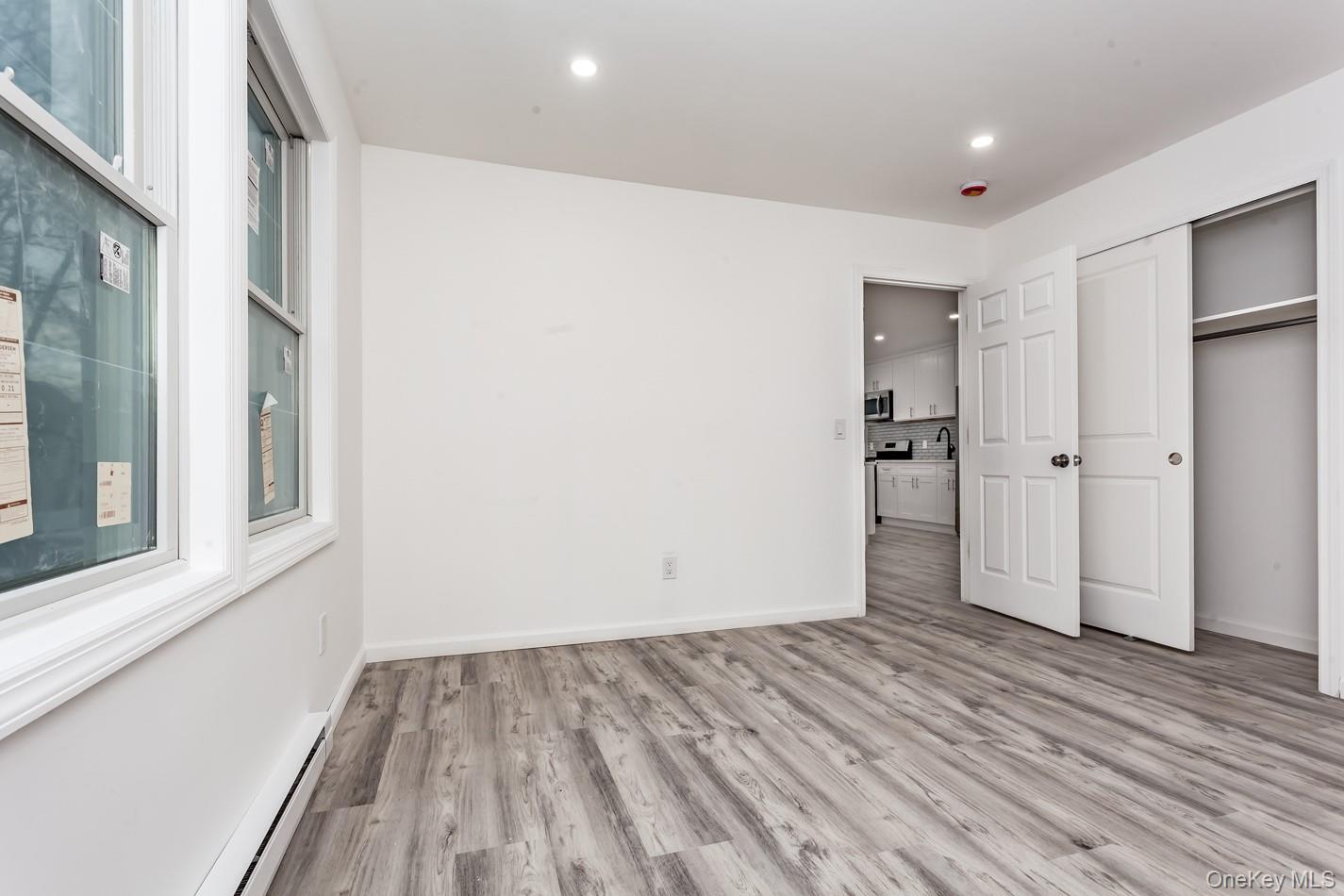 300 Highland Avenue, Unit 5 Peekskill, NY 10566 - Photo 5 of 17 a view of empty room with wooden floor and entryway