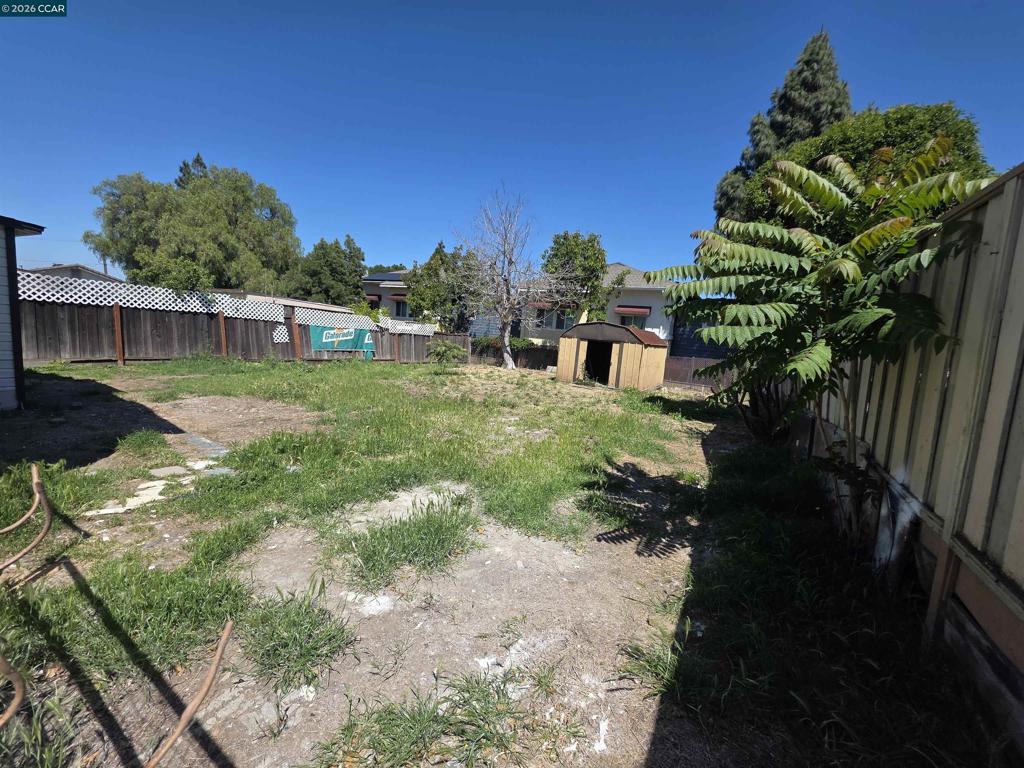 139 Ambrose Avenue Bay Point, CA 94565 - Photo 13 of 13 a backyard of a house with lots of green space