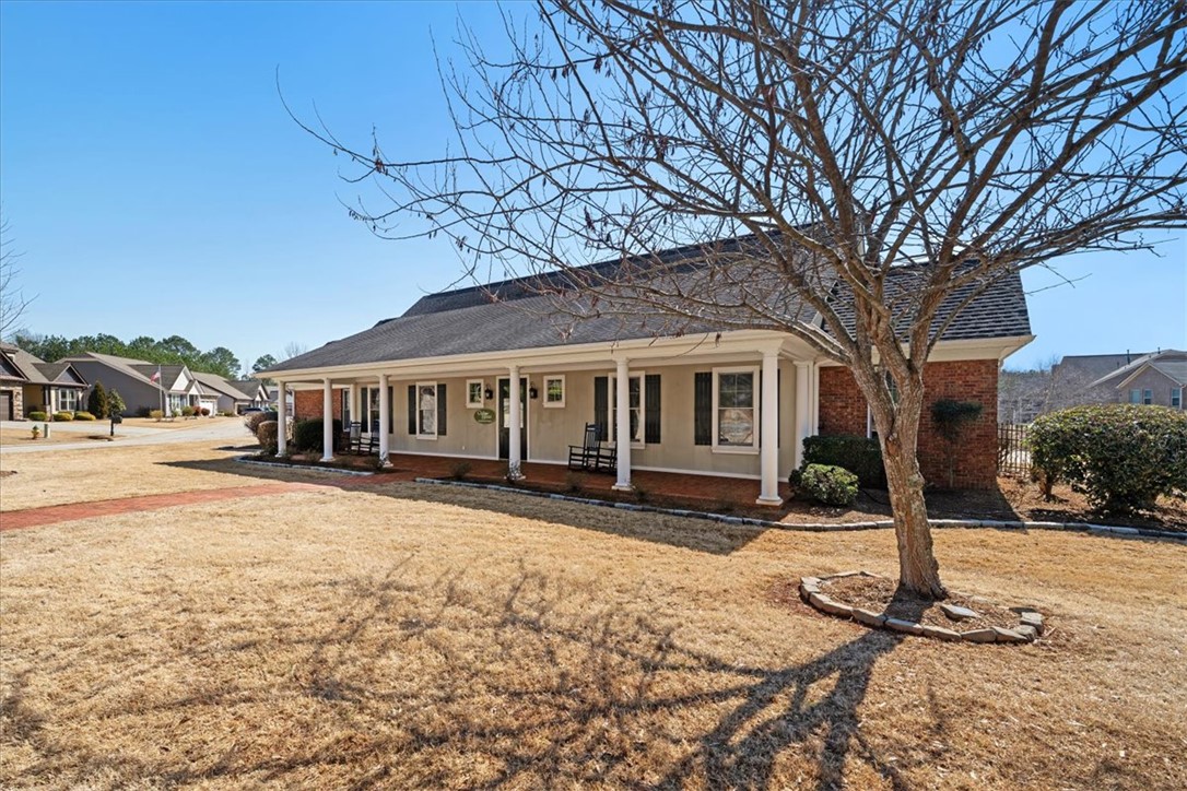 38 Angus Run Seneca, SC 29672 - Photo 5 of 46 This charming home presents an inviting facade with a welcoming covered front porch.