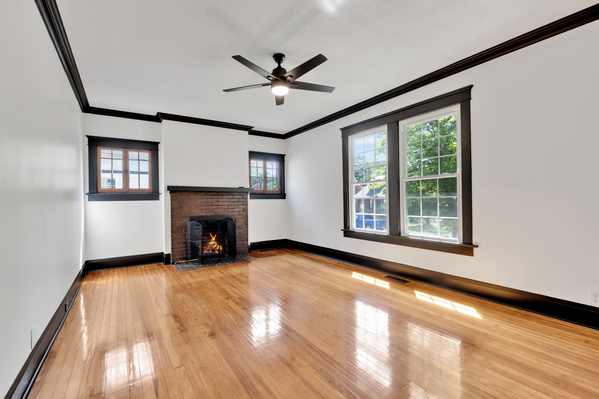 308 North Walnut Street Springfield, TN 37172 - Photo 30 of 35 a view of an empty room with a window and fireplace