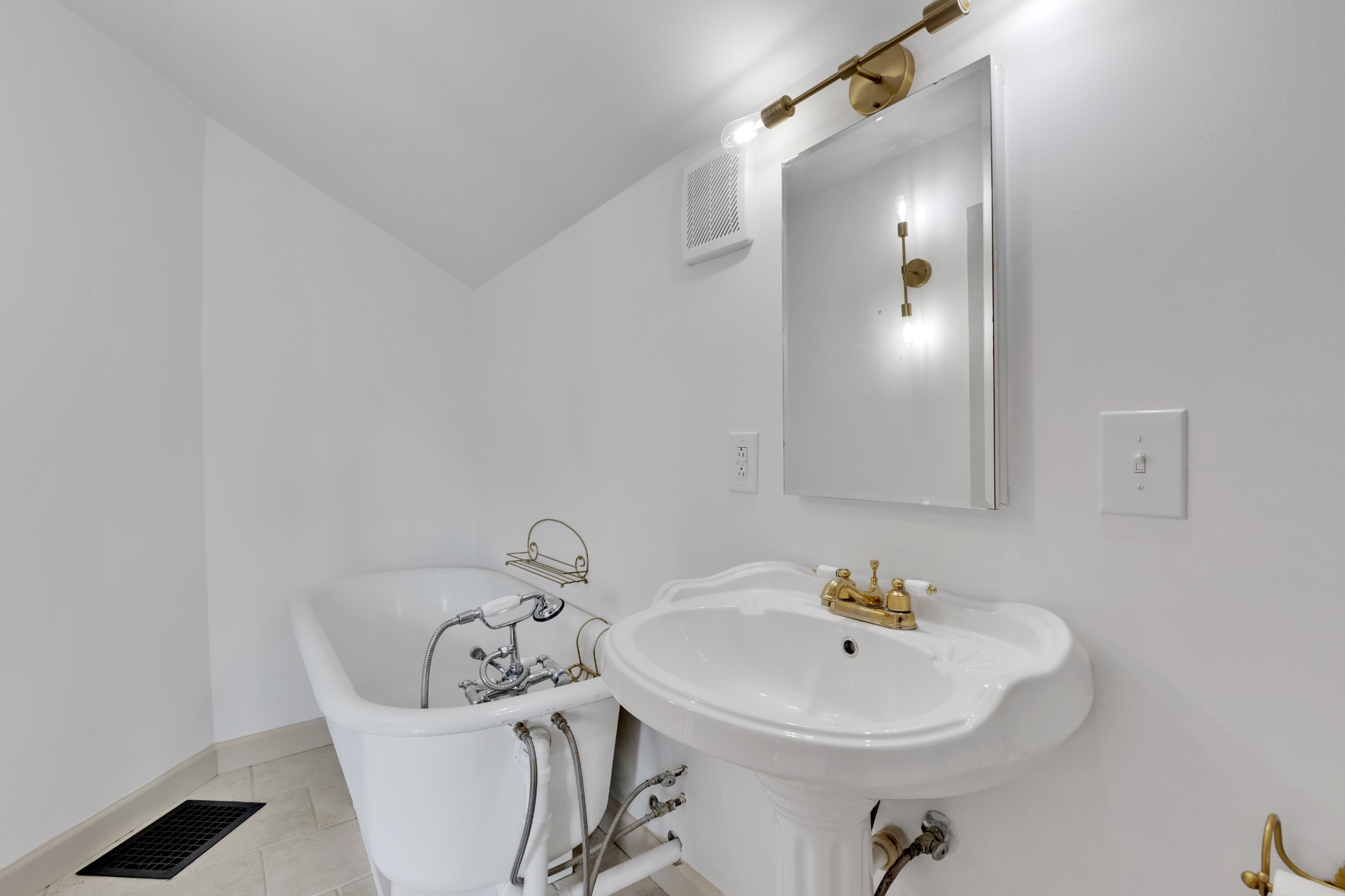 308 North Walnut Street Springfield, TN 37172 - Photo 8 of 35 a bathroom with a sink and a mirror