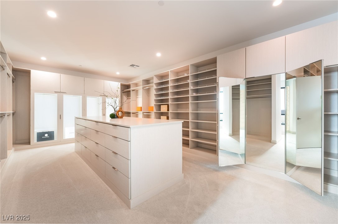 33 Falling Ridge Lane Henderson, NV 89011 - Photo 23 of 70 Spacious closet with light colored carpet