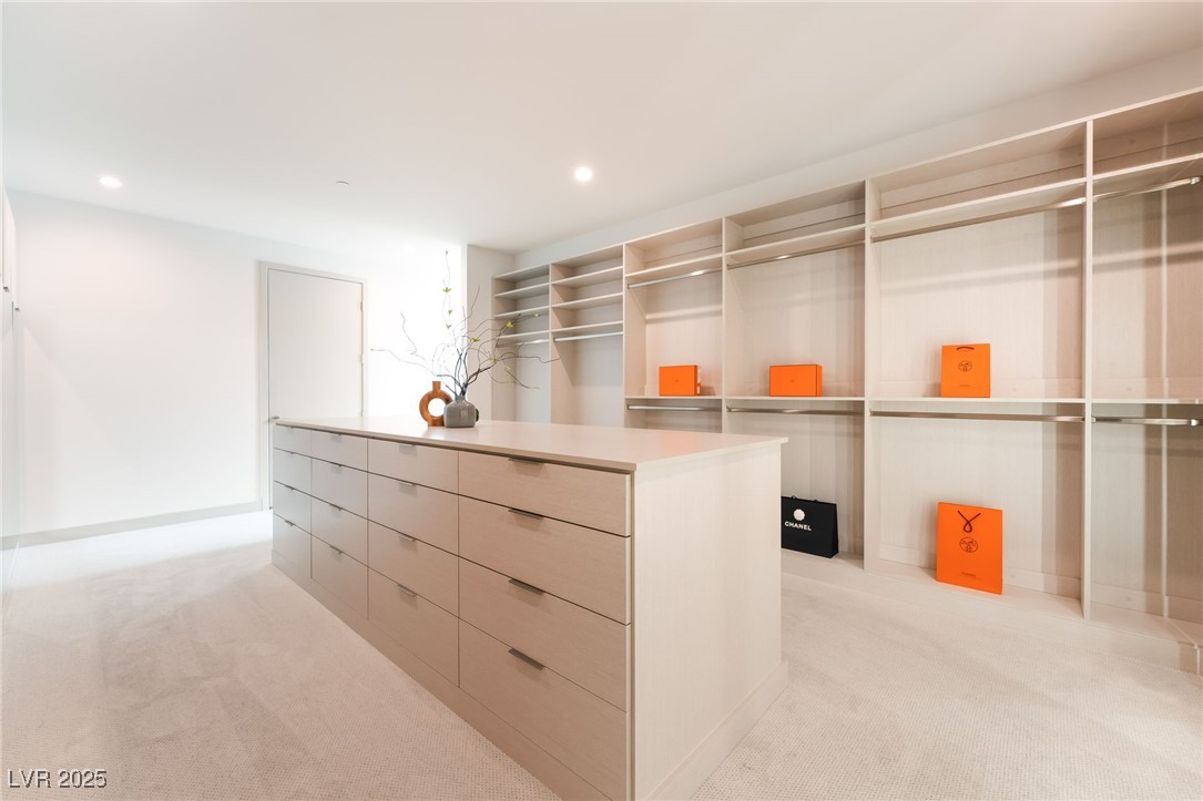 33 Falling Ridge Lane Henderson, NV 89011 - Photo 25 of 70 Walk in closet with light colored carpet