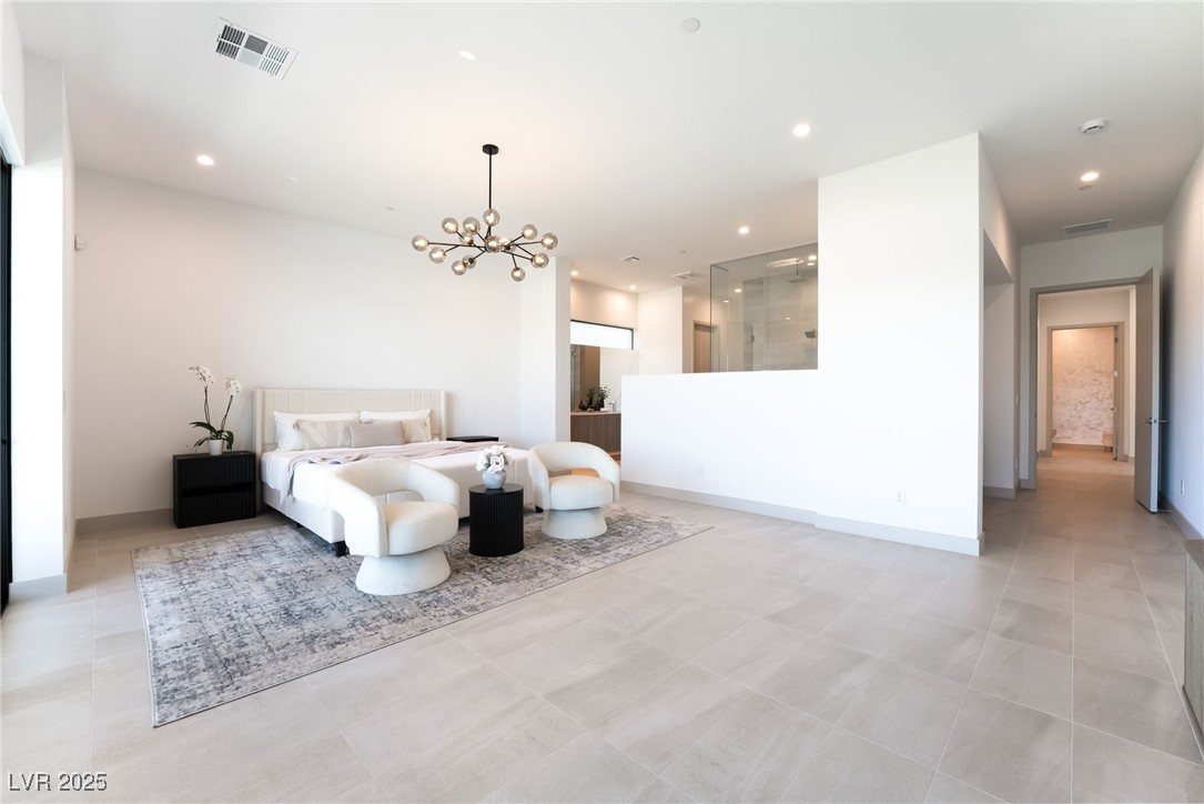33 Falling Ridge Lane Henderson, NV 89011 - Photo 27 of 70 Bedroom featuring recessed lighting and a chandelier