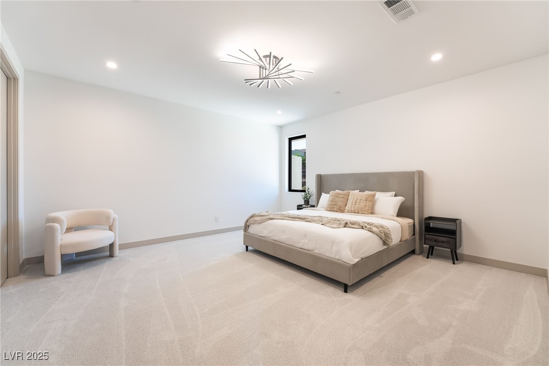 33 Falling Ridge Lane Henderson, NV 89011 - Photo 38 of 70 Bedroom with light carpet and recessed lighting