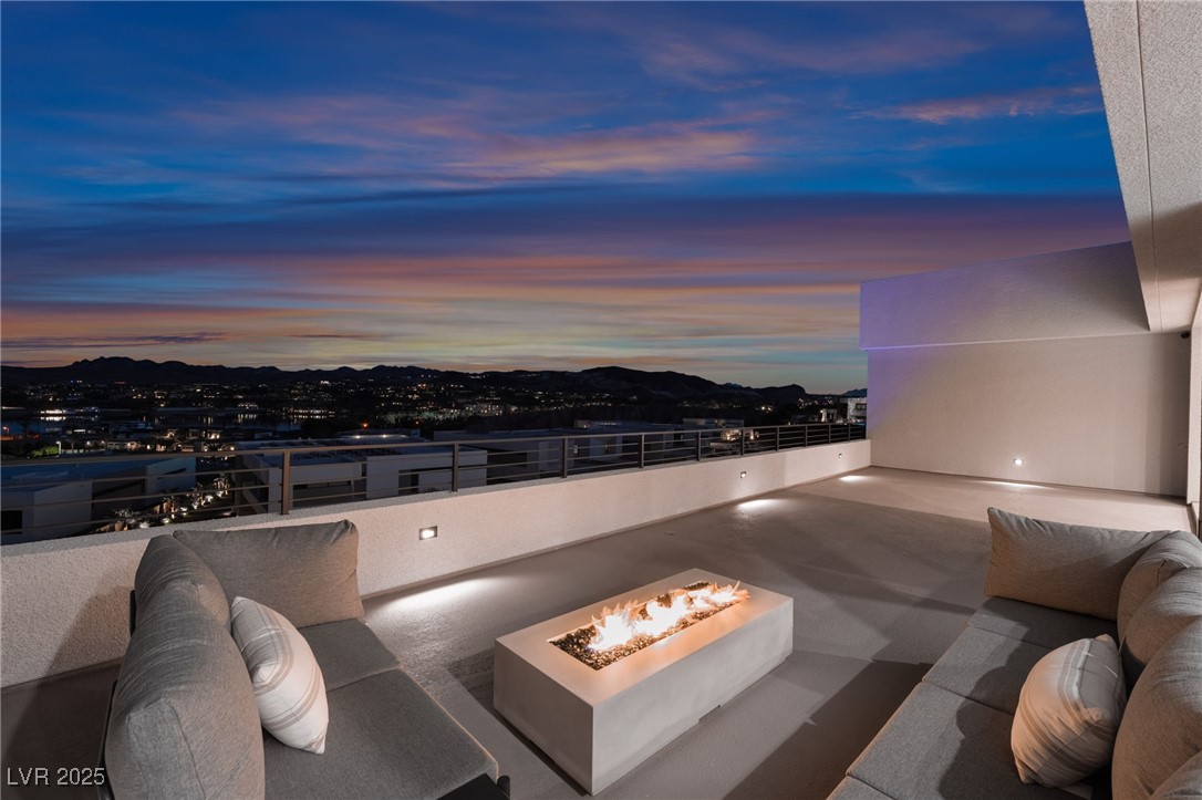 33 Falling Ridge Lane Henderson, NV 89011 - Photo 45 of 70 View of patio / terrace featuring an outdoor living space with a fire pit