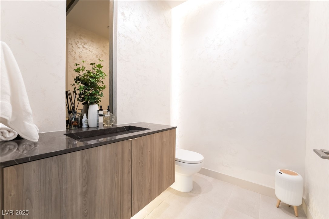33 Falling Ridge Lane Henderson, NV 89011 - Photo 59 of 70 Bathroom with vanity and light tile patterned floors