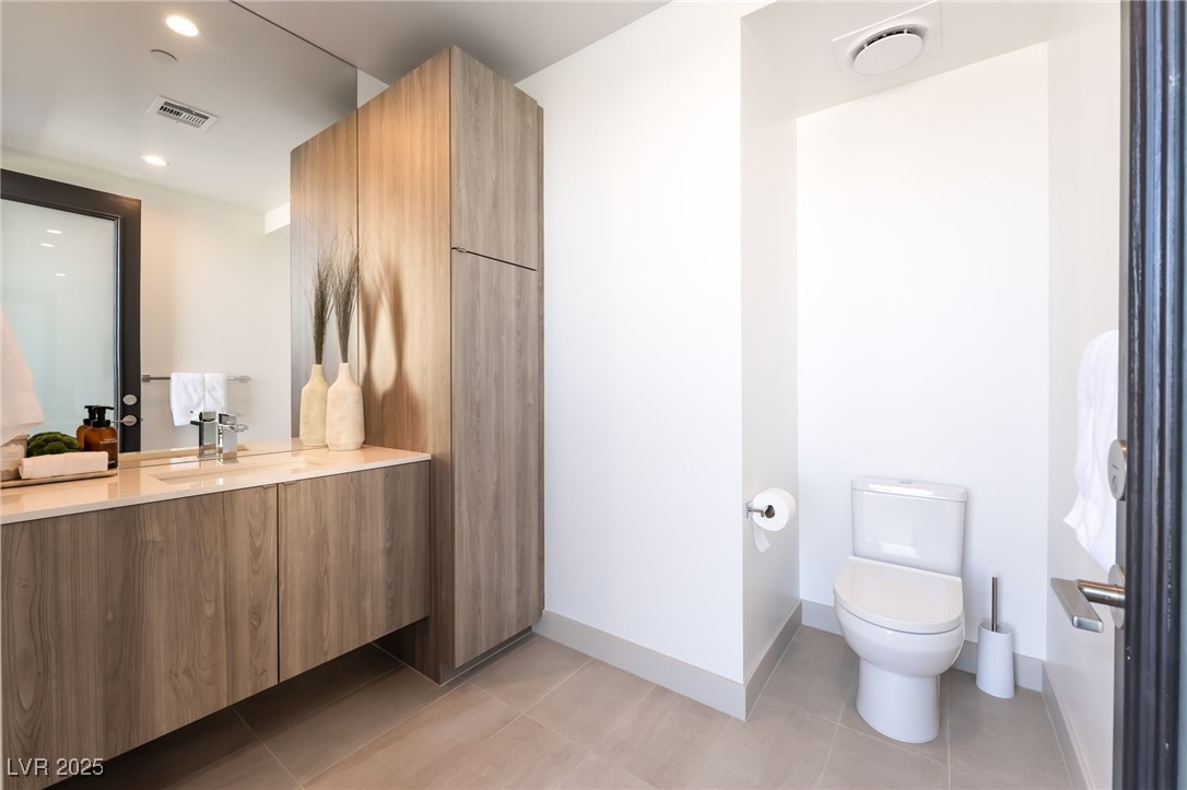 33 Falling Ridge Lane Henderson, NV 89011 - Photo 60 of 70 Bathroom with vanity, light tile patterned flooring, and recessed lighting