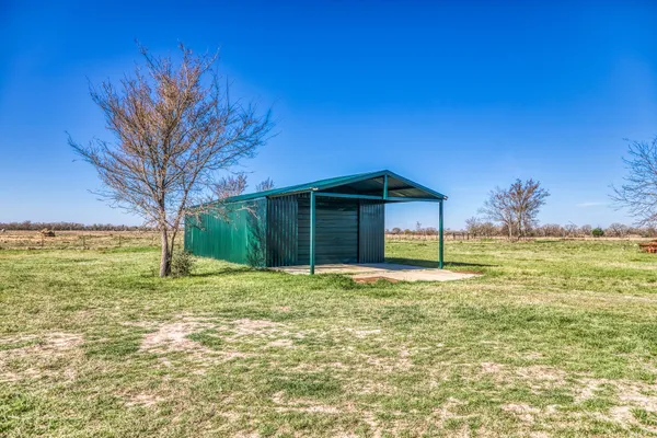 a big room with an empty space and outdoor space