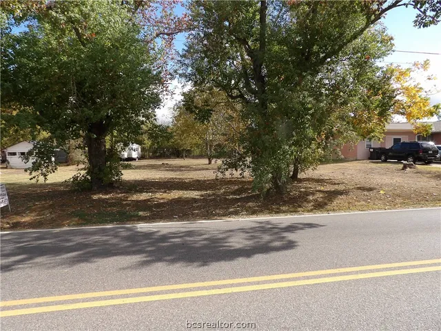 a view of street with houses