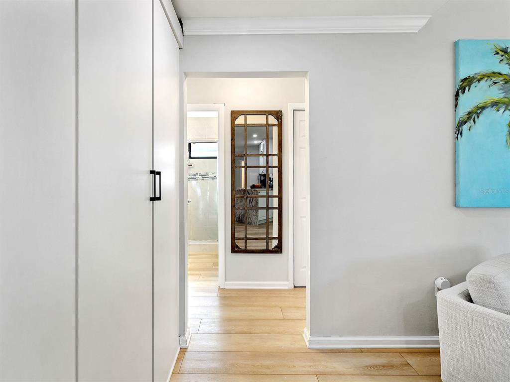 6502 Bikini Way Sarasota, FL 34241 - Photo 19 of 43 a view of an entryway with wooden floor