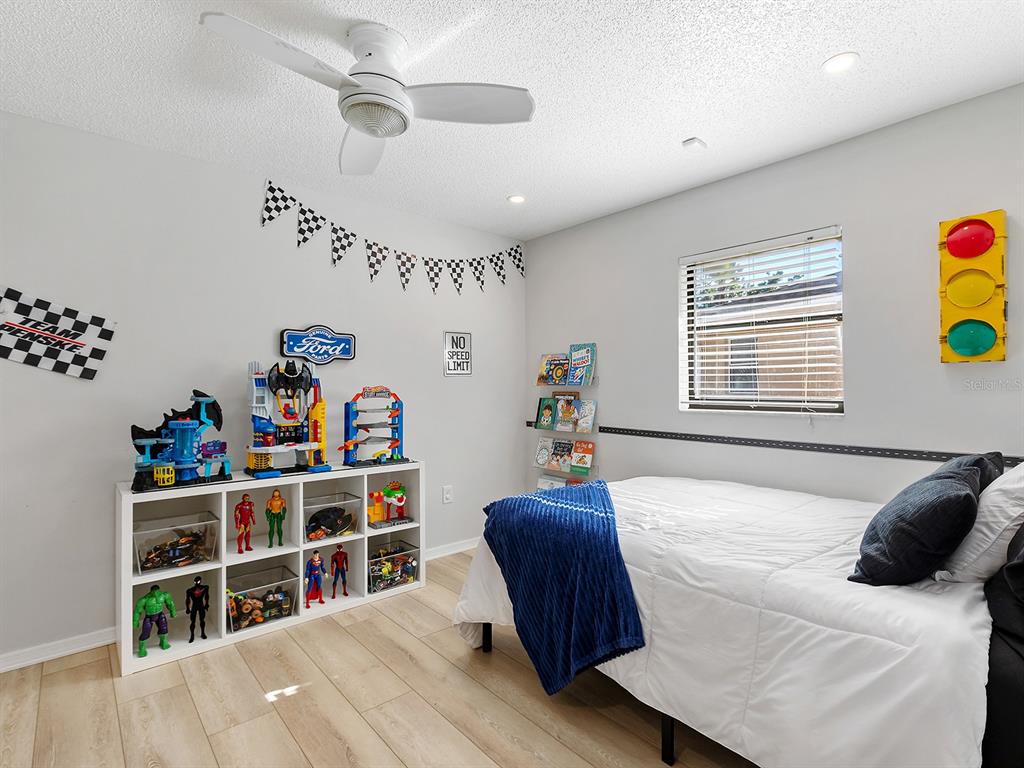 6502 Bikini Way Sarasota, FL 34241 - Photo 23 of 43 a bed room with a bed and a window