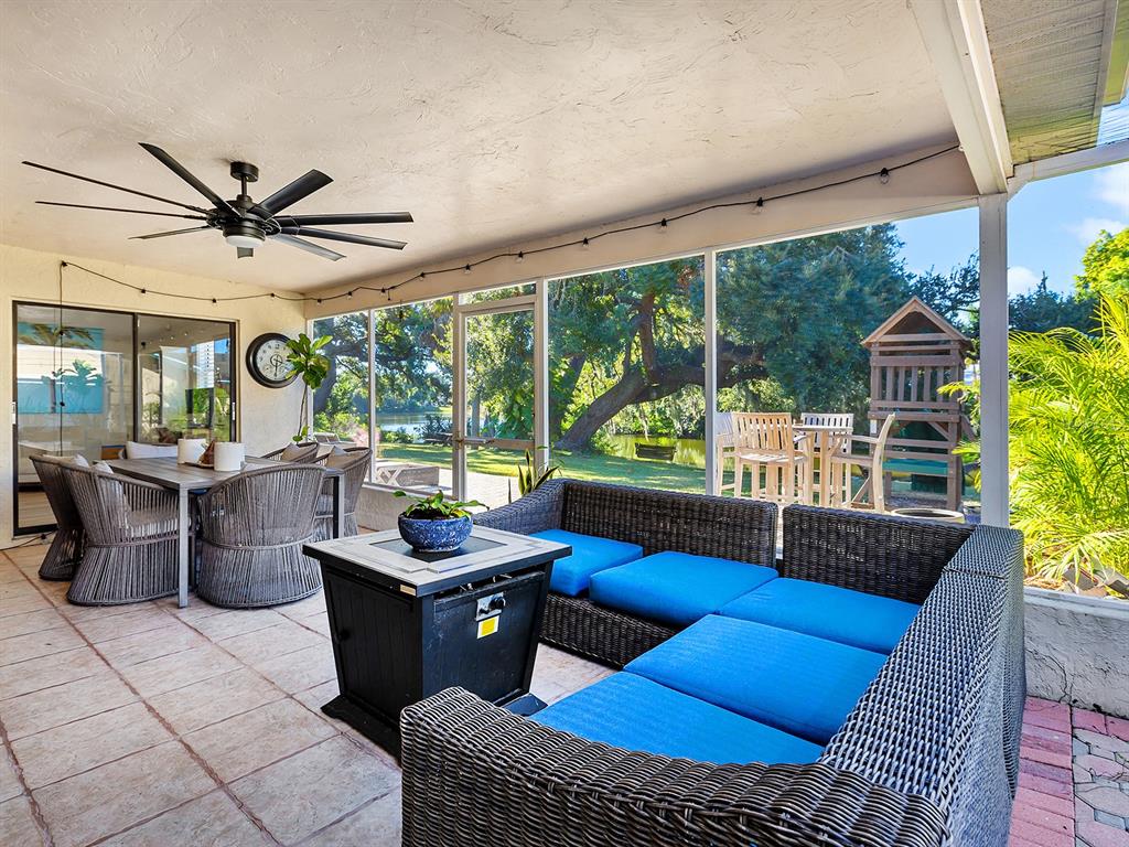 6502 Bikini Way Sarasota, FL 34241 - Photo 29 of 43 a work room with furniture and a floor to ceiling window