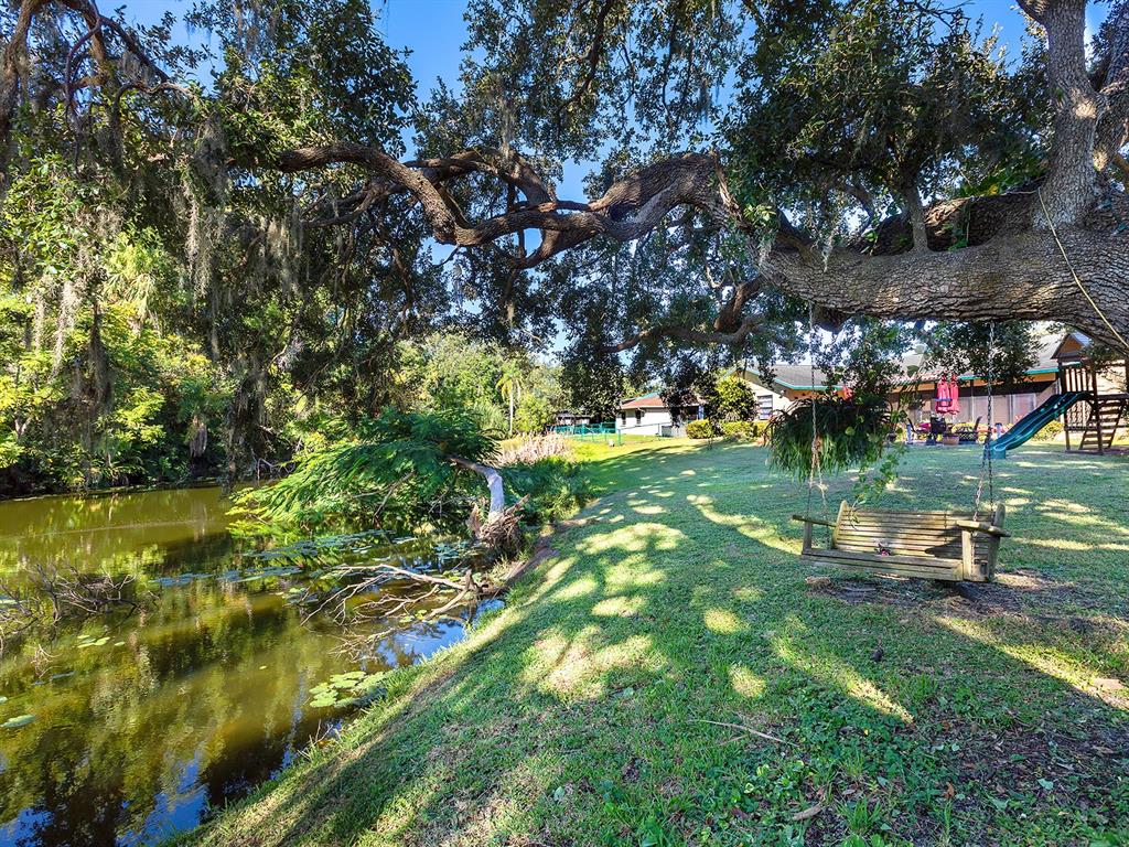 6502 Bikini Way Sarasota, FL 34241 - Photo 35 of 43 a view of yard with green space