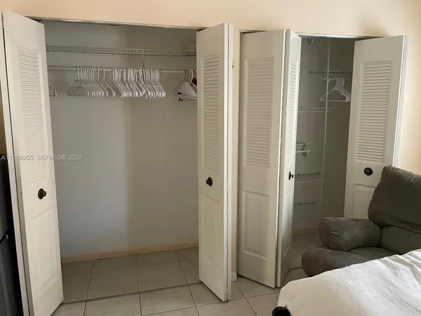 a bathroom with a tub and shower