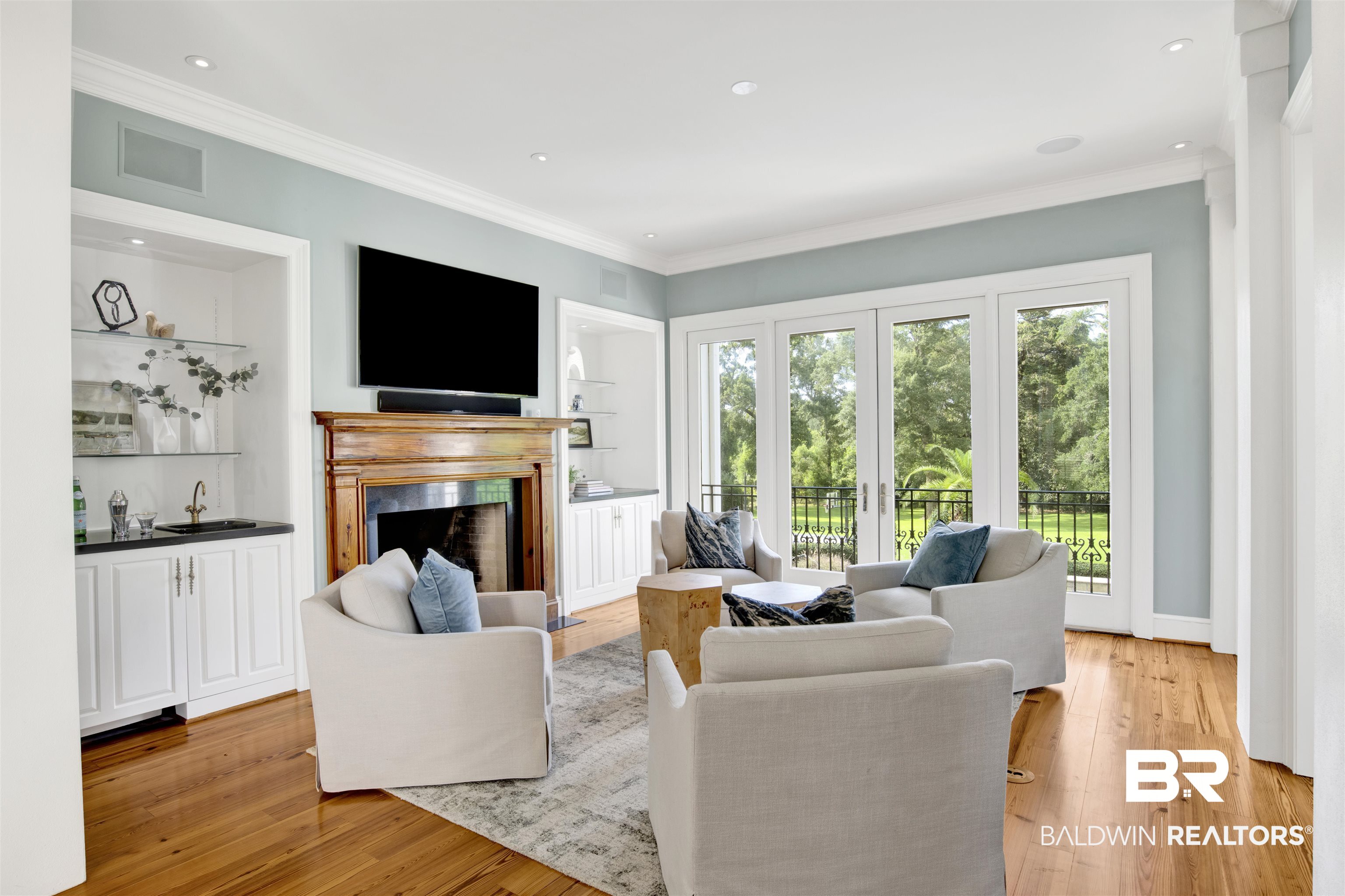 3816 Austill Lane Mobile, AL 36608 - Photo 18 of 80 Living room featuring light wood finished floors, a fireplace, crown molding, and recessed lighting